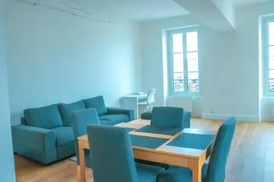 Coin salon dans l'établissement Grand 2P vue seine