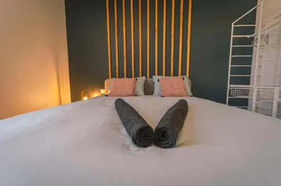 Un ou plusieurs lits dans un hébergement de l'établissement La Villa Relax SPA Luxe