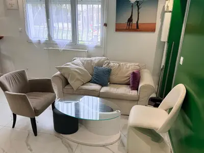 Coin salon dans l'établissement Sublime appartement T3