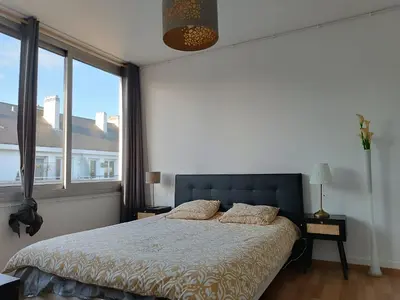 Un ou plusieurs lits dans un hébergement de l'établissement Appartement cathédrale