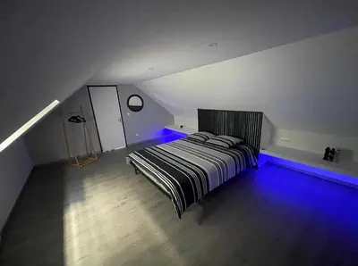 Un ou plusieurs lits dans un hébergement de l'établissement Appartement Amiens-Camon