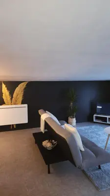 Télévision ou salle de divertissement dans l'établissement Jolie maison de campagne - Morisel