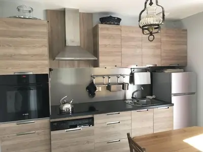 Cuisine ou kitchenette dans l'établissement Metrie