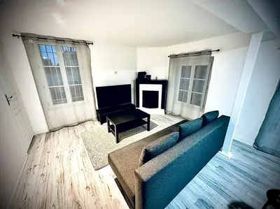 Coin salon dans l'établissement Appartement duplex à Chantilly centre