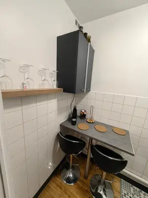 Cuisine ou kitchenette dans l'établissement Studio Chaleureux proche gare