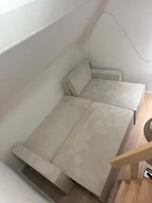 Coin salon dans l'établissement Appartement cocooning