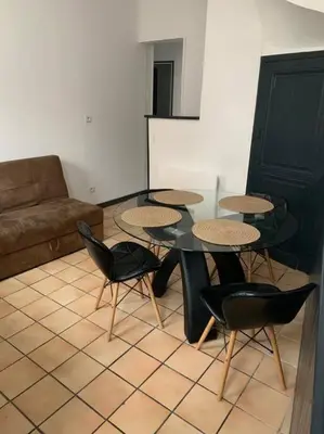 Coin salon dans l'établissement Maison proche centre-ville 4 personnes 2 chambres
