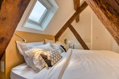 Un ou plusieurs lits dans un hébergement de l'établissement Les Loges Saint Éloi Somptueux F4 pour 7 personnes