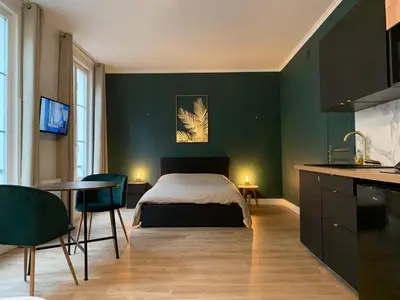 Un ou plusieurs lits dans un hébergement de l'établissement Studio N°2 Plein coeur de Rouen