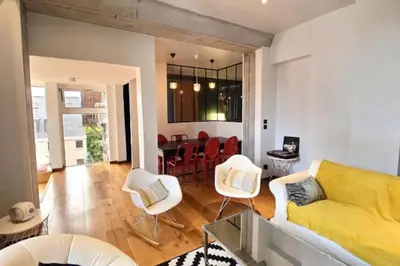 Coin salon dans l'établissement Appartement Design Rouen-gare avec parking privé