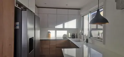 Cuisine ou kitchenette dans l'établissement Sweet Home Maison entière