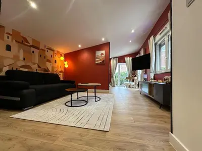 Coin salon dans l'établissement Loft O'Chalet - 10 min GARE - PARKING PRIVÉ