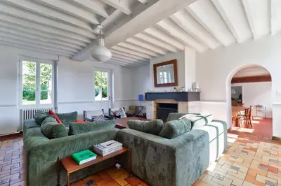 Coin salon dans l'établissement Grangebelle Maison 7 Chambres
