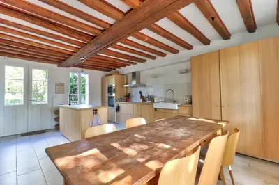 Cuisine ou kitchenette dans l'établissement Grangebelle Maison 7 Chambres