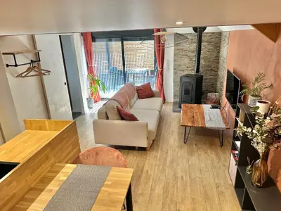Coin salon dans l'établissement La Ptite Maison proche Rouen