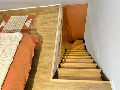 Un ou plusieurs lits dans un hébergement de l'établissement La Ptite Maison proche Rouen