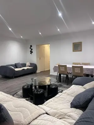 Coin salon dans l'établissement Logement Friville