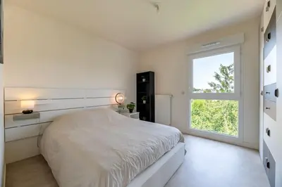 Un ou plusieurs lits dans un hébergement de l'établissement Appartement du Blanchet très agréable