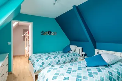 Un ou plusieurs lits dans un hébergement de l'établissement Les 3 Hirondelles - Maison avec grand jardin