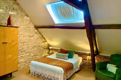 Un ou plusieurs lits dans un hébergement de l'établissement Les Gîtes de Pronleroy l Gîte Rural 27 Couchages et SPA En Picardie