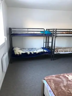 Un ou plusieurs lits dans un hébergement de l'établissement Aladin resort