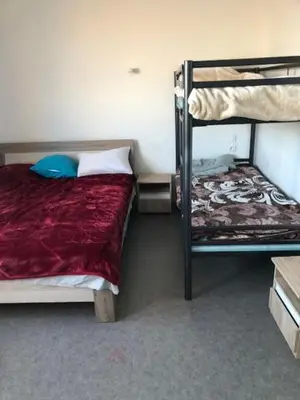 Un ou plusieurs lits dans un hébergement de l'établissement Aladin resort