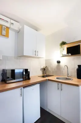 Cuisine ou kitchenette dans l'établissement La Casa : Logement en centre ville, Cathédrale