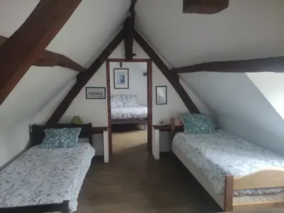 Un ou plusieurs lits dans un hébergement de l'établissement LA PETITE GRANGE