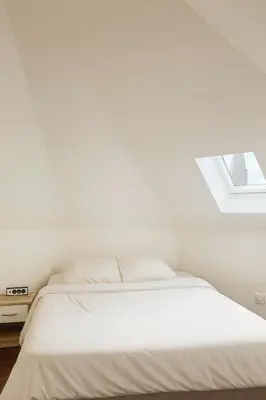 Un ou plusieurs lits dans un hébergement de l'établissement La maison Mareuil