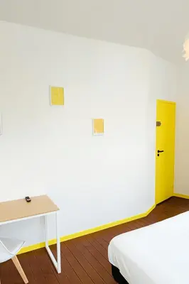 Un ou plusieurs lits dans un hébergement de l'établissement La maison Mareuil