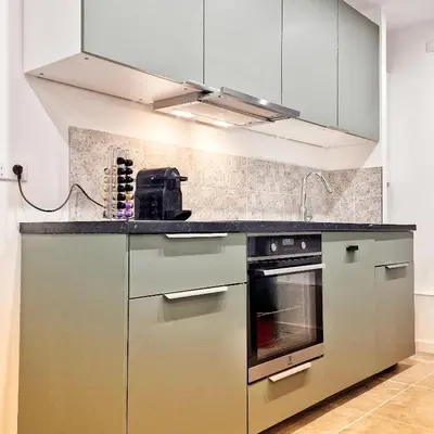Cuisine ou kitchenette dans l'établissement Maison Mayel - Élégance & Nature à 30 min de Paris, proche Chantilly