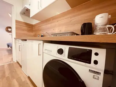 Cuisine ou kitchenette dans l'établissement Le petit Gervais - 289