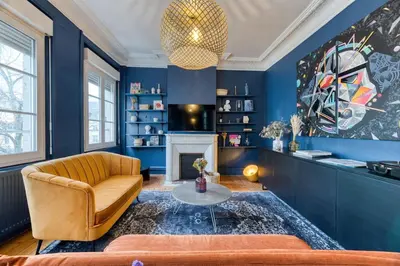 Coin salon dans l'établissement Appartement balnéo centre