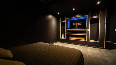 Un ou plusieurs lits dans un hébergement de l'établissement Pool47spa
