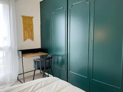 Un ou plusieurs lits dans un hébergement de l'établissement Appartement élégant-Patte d'Oie
