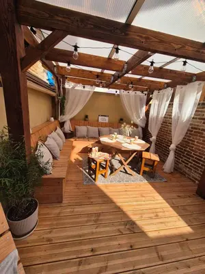 Coin salon dans l'établissement Le Cœur du Bien-être - Gîte grande capacité - 6 chambres - Superbe emplacement - Vue Seine - Décoration soignée - Coin touristique