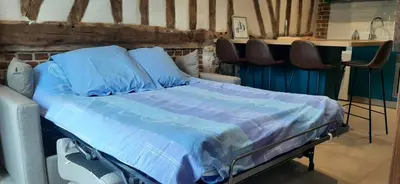 Un ou plusieurs lits dans un hébergement de l'établissement Le Thuit - F2 Plain pied tout équipé à la ferme