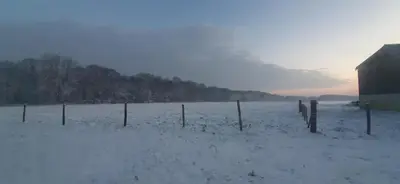 L'établissement Le Thuit - F2 Plain pied tout équipé à la ferme en hiver