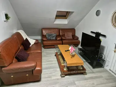 Coin salon dans l'établissement Appartement meublé , 1 chambre