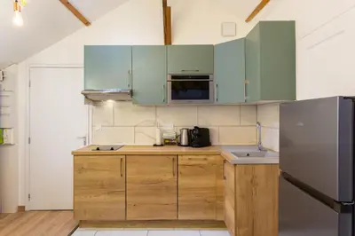 Cuisine ou kitchenette dans l'établissement L'invention poétique - T2 charmant en Hyper centre
