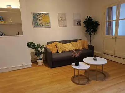 Coin salon dans l'établissement Appartement proche centre historique