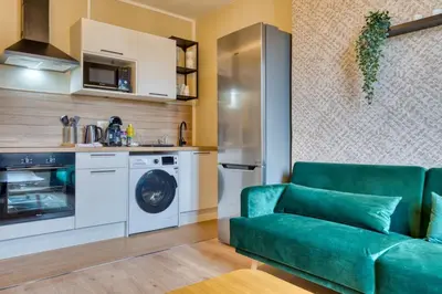 Cuisine ou kitchenette dans l'établissement Mathilde Appartement proche Clinique Mathilde