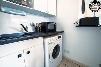 Cuisine ou kitchenette dans l'établissement rouen gare logement avec parking