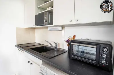 Cuisine ou kitchenette dans l'établissement rouen gare logement avec parking