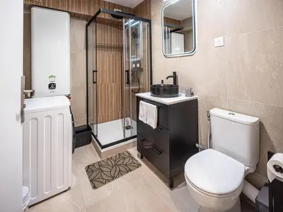 Salle de bains dans l'établissement Appartement cocooning en centre-ville - Résidence le Colisée