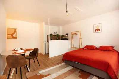 Un ou plusieurs lits dans un hébergement de l'établissement Sweet Home : : studio en Hypercentre Cathédrale