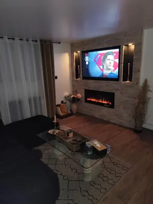 Télévision ou salle de divertissement dans l'établissement Château de la sagesse SPA