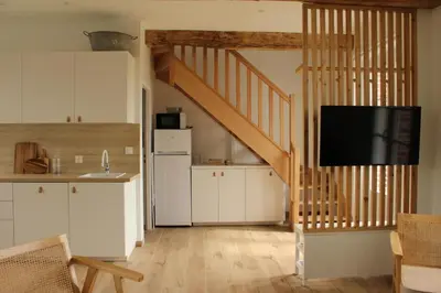 Cuisine ou kitchenette dans l'établissement La Poulinière