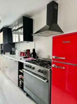 Cuisine ou kitchenette dans l'établissement Home seventy - Guest House