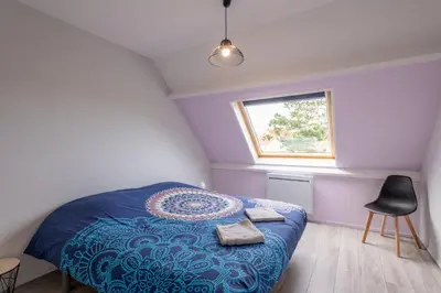 Un ou plusieurs lits dans un hébergement de l'établissement Douce Écume - Maison à moins dun km de la plage